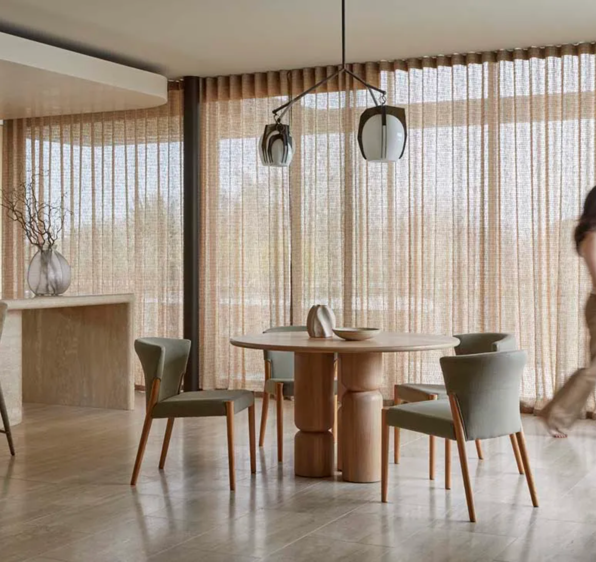 Hourglass Legs Round Dining Table