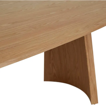 Sculptural Curved Base Dining Table