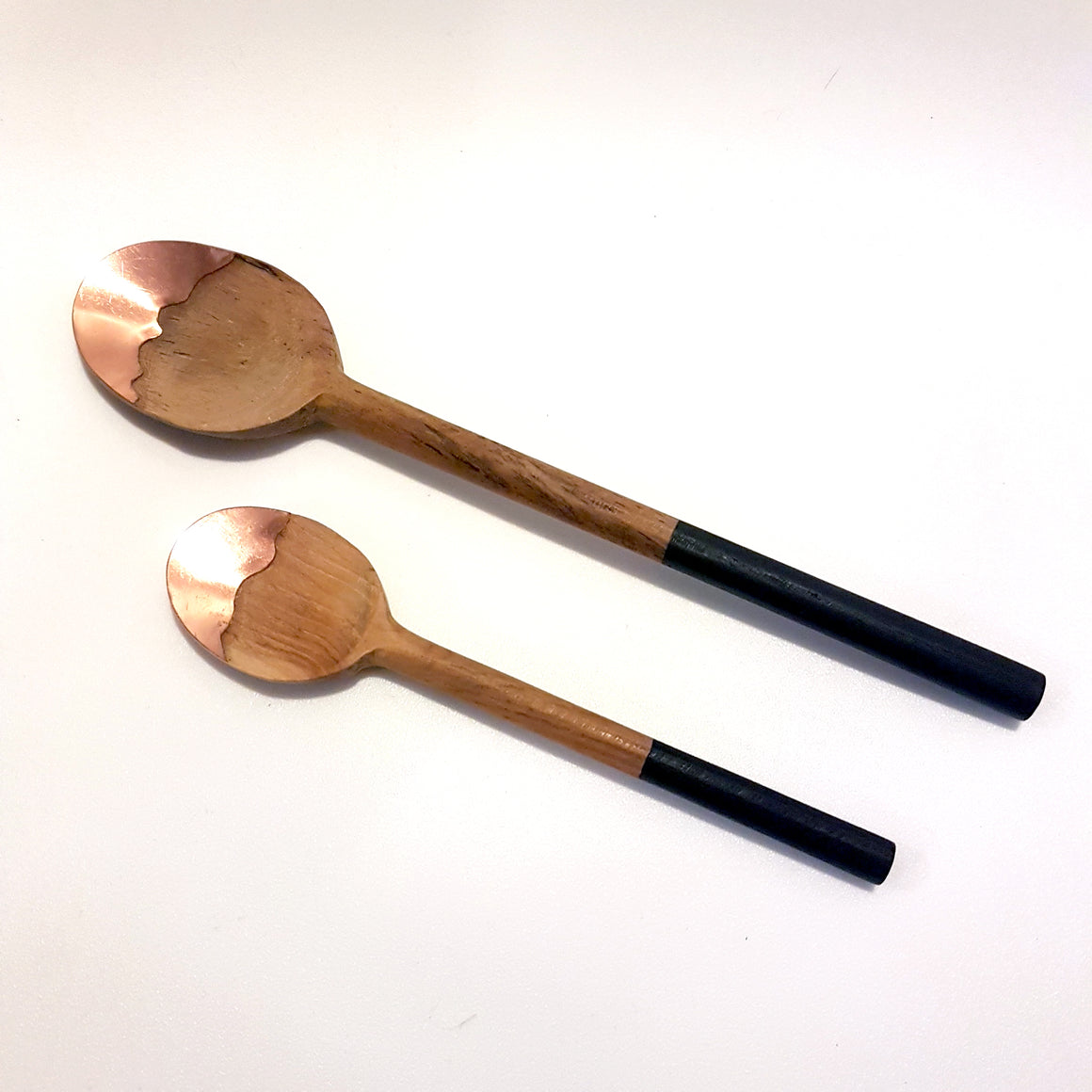 Large wooden spoon with copper tip