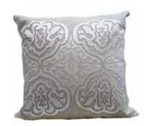 Neutral embroidered cushion